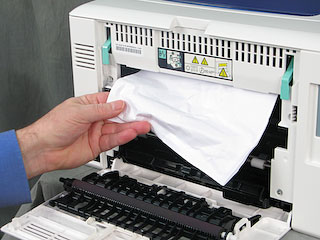 Remove any jammed, crumpled, wrinkled, or torn paper